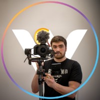 Tanner Mulay holding a camera rig.